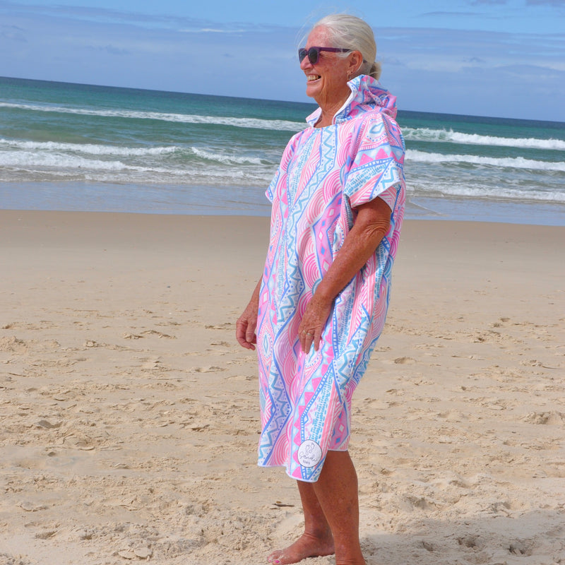 Adult wearing Xalli sand-free beach hoodie showing comfort and style