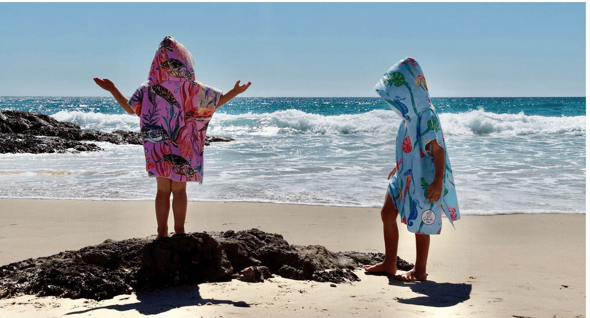 Beat the Beach Blues: Stay Sand-Free with Fun and Sustainable Hoodies! - Sandi Toes