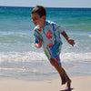 Earth and Sea - Sand-Free Beach Hoodie - Sandi Toes running on the beach