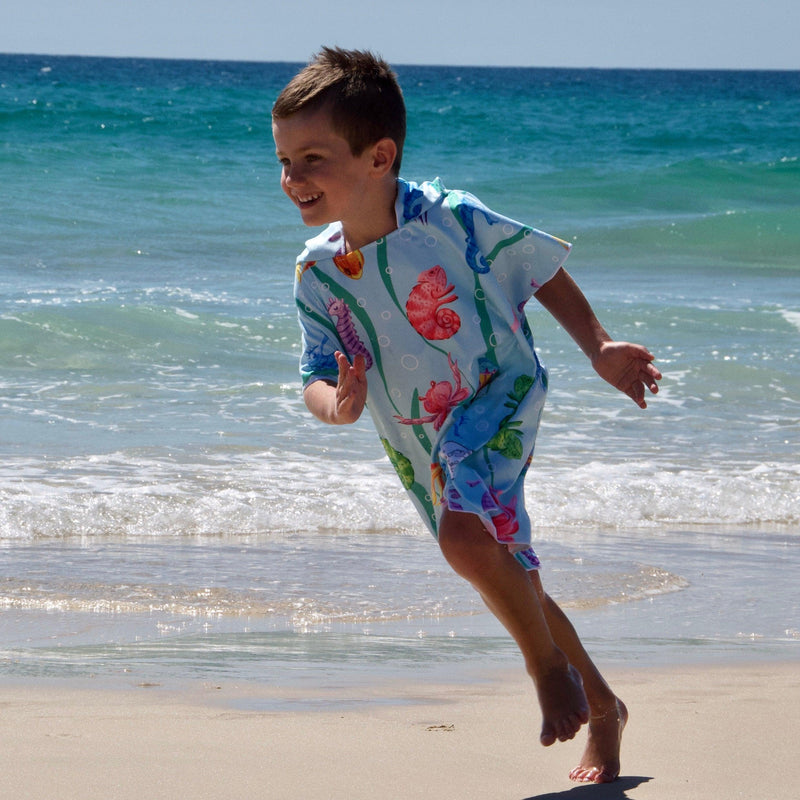 Earth and Sea - Sand-Free Beach Hoodie - Sandi Toes running on the beach
