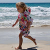 Island Princess - Sand-Free Beach Hoodie - Sandi Toes running on the beach in a small sand free hoodie