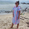 Adult wearing Xalli sand-free beach hoodie showing comfort and style