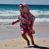 Turtle Cove - Sand-Free Beach Hoodie - Sandi Toes, running on the beach in a small