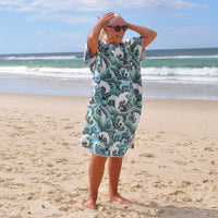 Adult wearing Wipeout sand-free beach hoodie showing comfort and style.