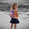 Turtle Cove - Sand-Free Beach Hoodie - Sandi Toes wearing the back pack drawstring bag 