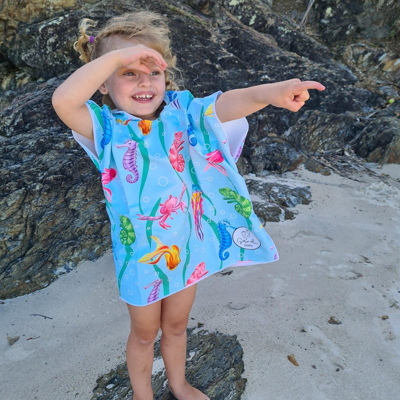 Earth and Sea - Sand-Free Beach Hoodie - Sandi Toes pointing at the surf